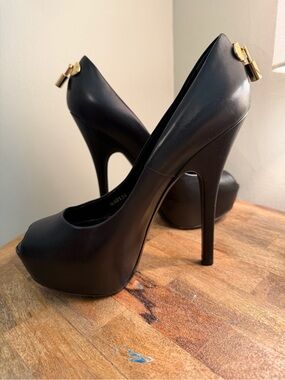 Louis Vuitton Locked In “Oh, Really!” Calf Skin Leather Peep Toe Platform Pumps